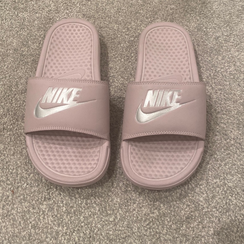 Pink Nike slides. Size 6